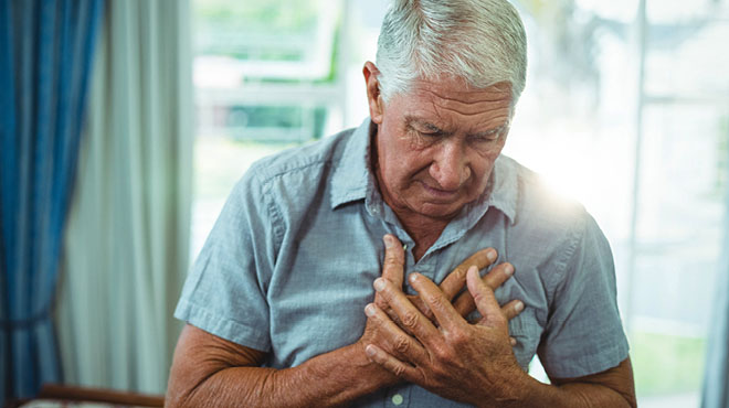 Older man trying to catch his breath