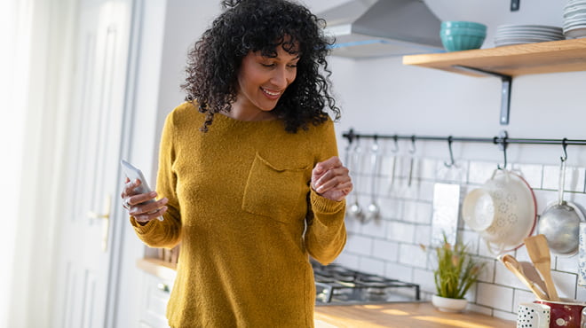 https://www.mayoclinichealthsystem.org/-/media/national-files/images/hometown-health/2021/holding-cellphone-in-hand-in-kitchen.jpg?sc_lang=en