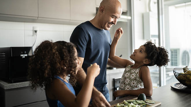 Kids in kitchen with parent