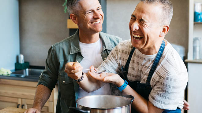 Cooking together and laughing