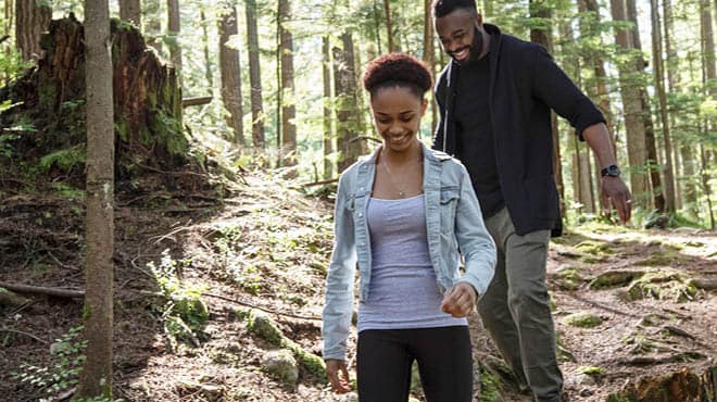 Couple hiking in woods