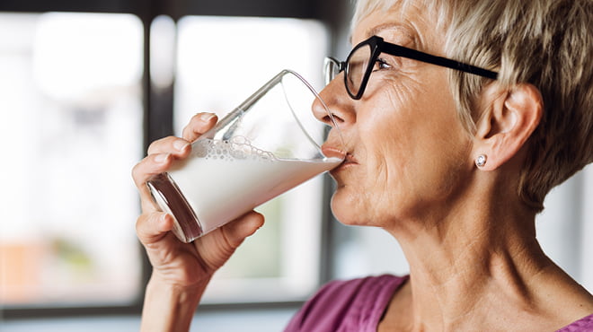 Drinking glass of milk