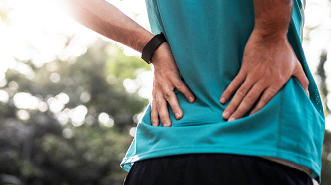 Waking up with lower back pain: Causes and treatment