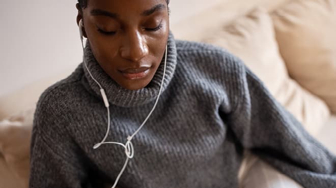 Sweater with clearance earbuds