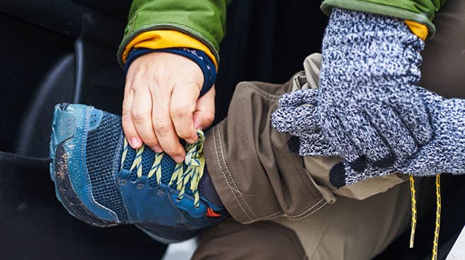 Untying shoe in winter