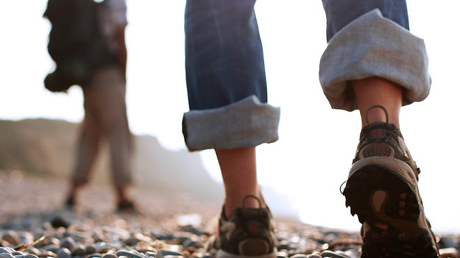 Walking on rocks cuffed jeans