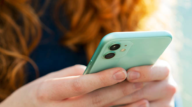 Close-up of holding cellphone