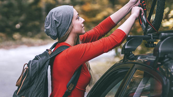 Loading bicycle on car rack