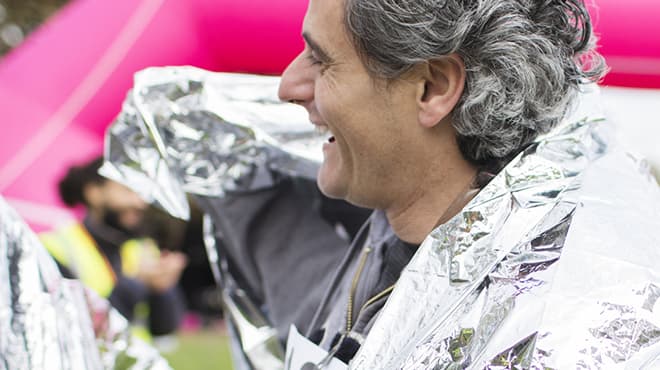 Runner wrapped in foil warming blanket