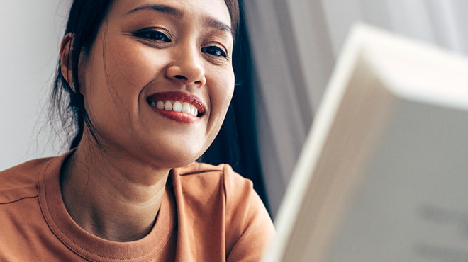 https://www.mayoclinichealthsystem.org/-/media/national-files/images/hometown-health/2023/smiling-looking-at-computer-screen.jpg?sc_lang=en