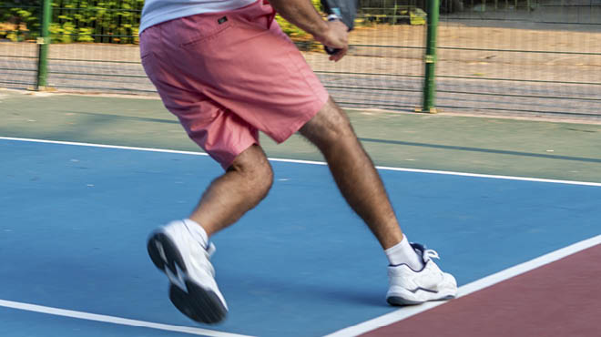 Pickleball player on court