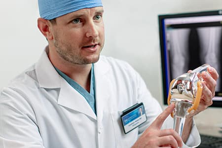 Doctor pointing to an artificial joint